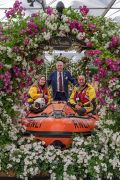 Ian Limmer from Peter Beales with Andy Croy and Leanne McColm from RNLI
